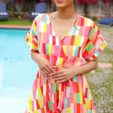 Eyes On You Coral & Yellow Geo Abstract Surplice Woven Romper